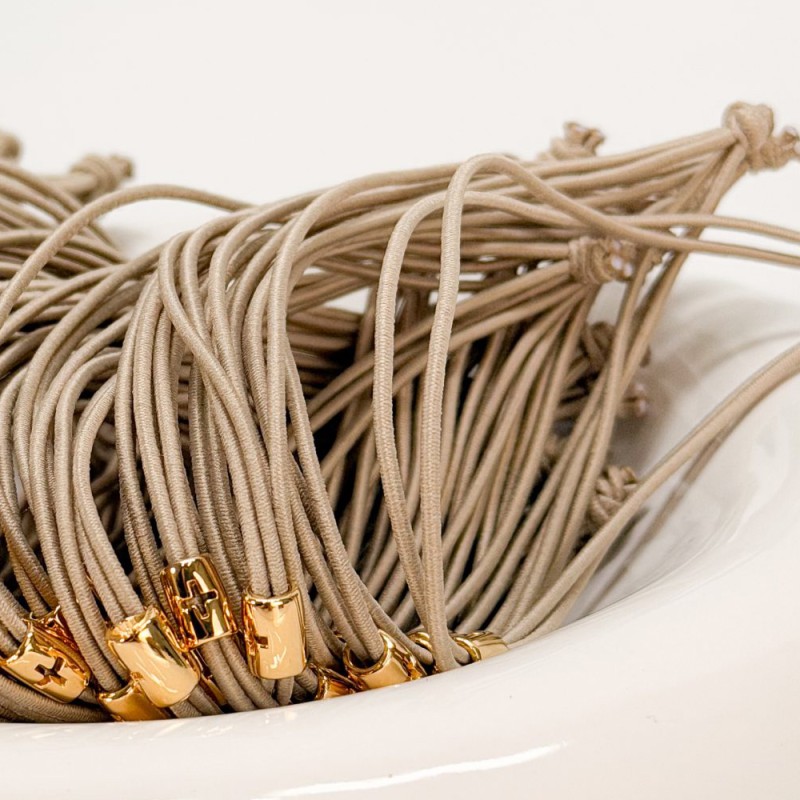 Μαρτυρικό Βραχιόλι Βάπτισης Μπεζ Ελαστικό Κορδόνι με Επιχρυσωμένο Σταυρό