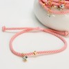 Μαρτυρικό Βραχιόλι με Ροζ Στριφτό Κορδόνι, Σταυρό & Στρας